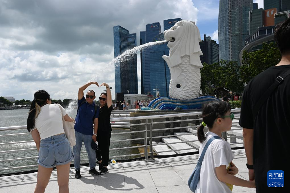 中国和新加坡签署互免持普通护照人员签证协定